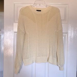 Pullover light weight sweater. Scoop neck with ribbed hem and cuffs.Size adult M